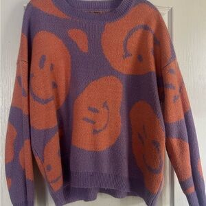 Vibrant Purple and Orange Smiley Face Sweater